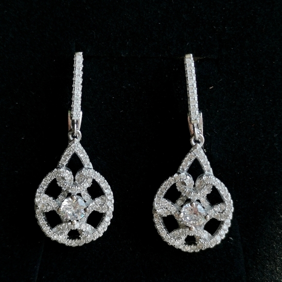 Sterling silver cz love knot dangle earrings lever back 🆕 - Picture 1 of 7